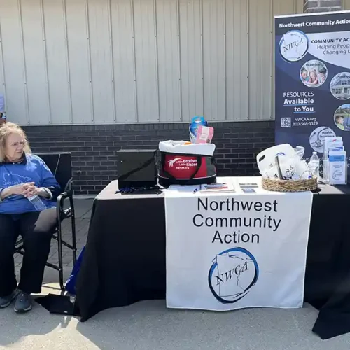Board Director, Carol Rhen, helped greet people at the Popcorn Social.